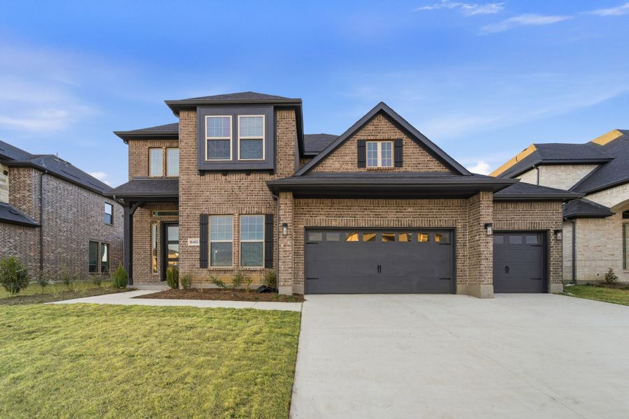 Front exterior of a new home in Green Meadows, Celina, TX, highlighting curb appeal (Image 1). Front exterior of a new home in Green Meadows, Celina, TX, highlighting curb appeal (Image 1).
