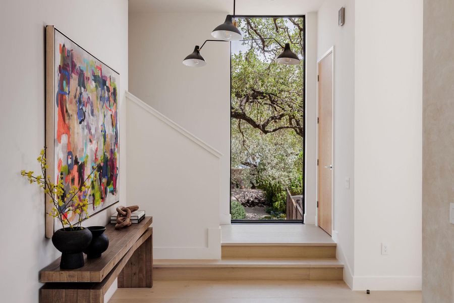 Foyer featuring wood finished floors Foyer featuring wood finished floors