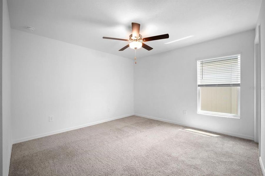 Spacious, unfurnished interior of a new home in North Park Isle, Plant City (Image 26).