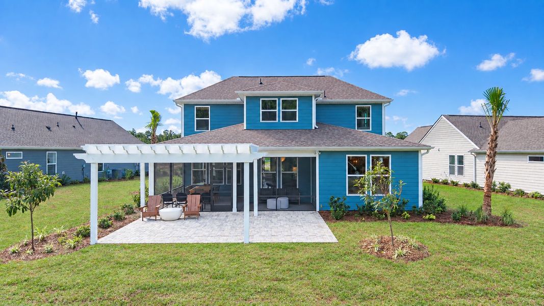 Exterior details and patio area of a home in Del Webb Ocean Isle Beach, Shallotte (Image 3).