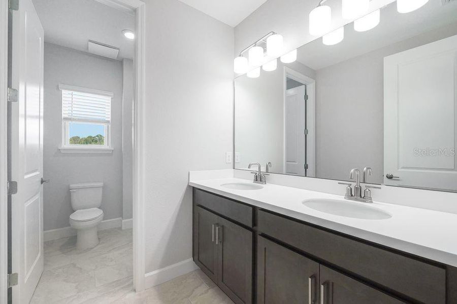 Furnished interior view inside a new home in Ardisia Park, New Smyrna Beach (Image 8).