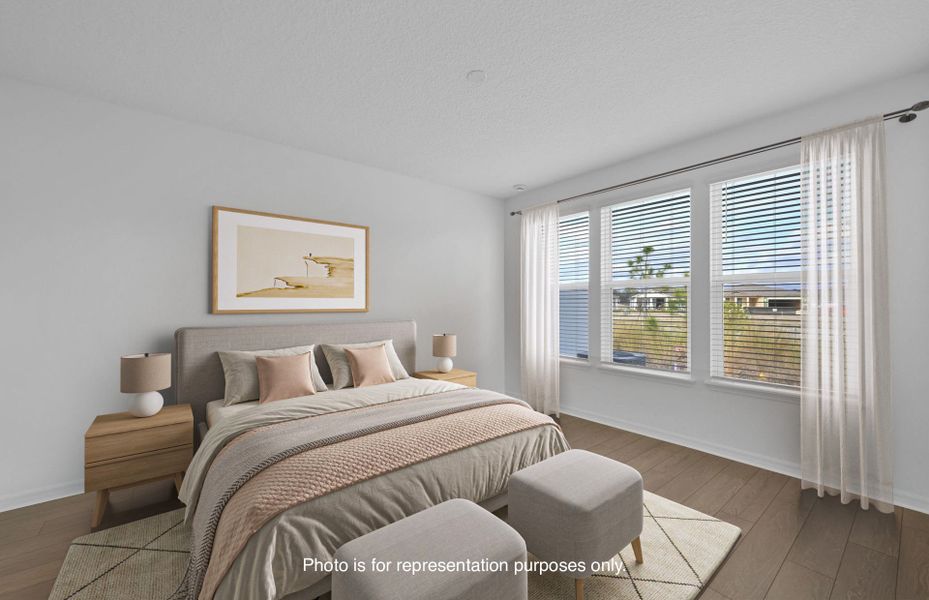 Furnished interior view inside a new home in Del Webb Wildlight, Yulee (Image 9).