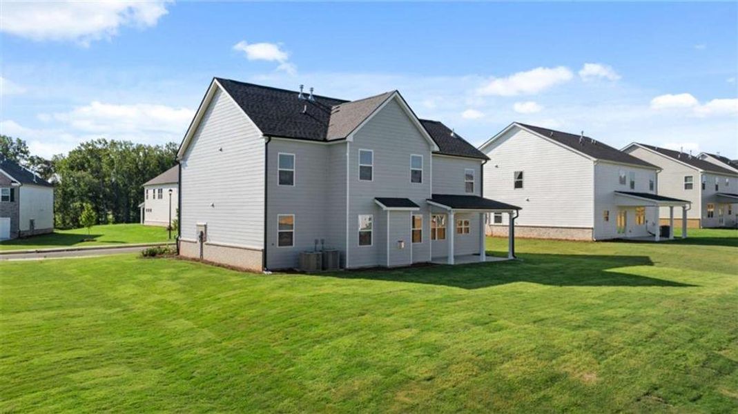 Exterior details and patio area of a home in Independence, Loganville (Image 12).