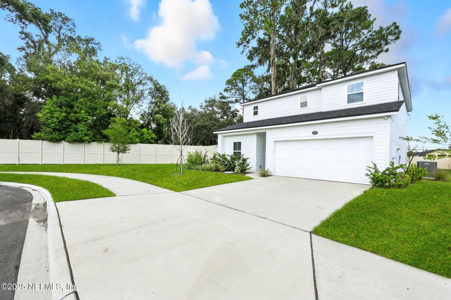 Front exterior of a new home in , Jacksonville, FL, highlighting curb appeal (Image 26).