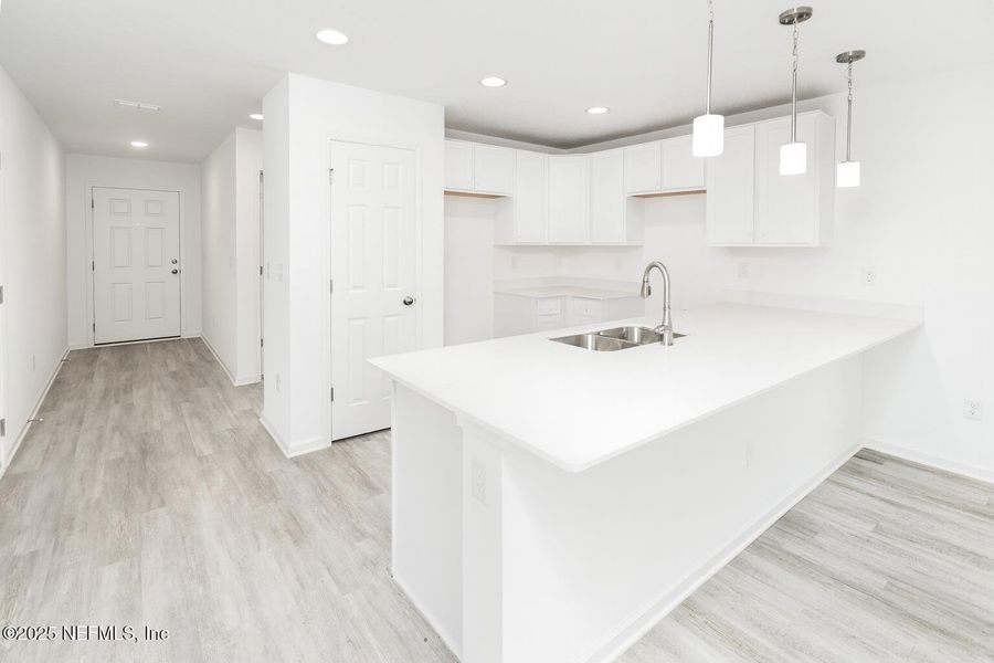 Furnished interior view inside a new home in , Jacksonville (Image 3). Furnished interior view inside a new home in , Jacksonville (Image 3).