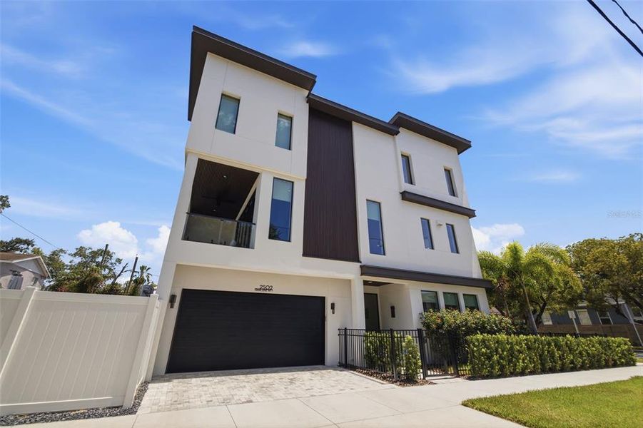 Front exterior of a new home in , Tampa, FL, highlighting curb appeal (Image 2).
