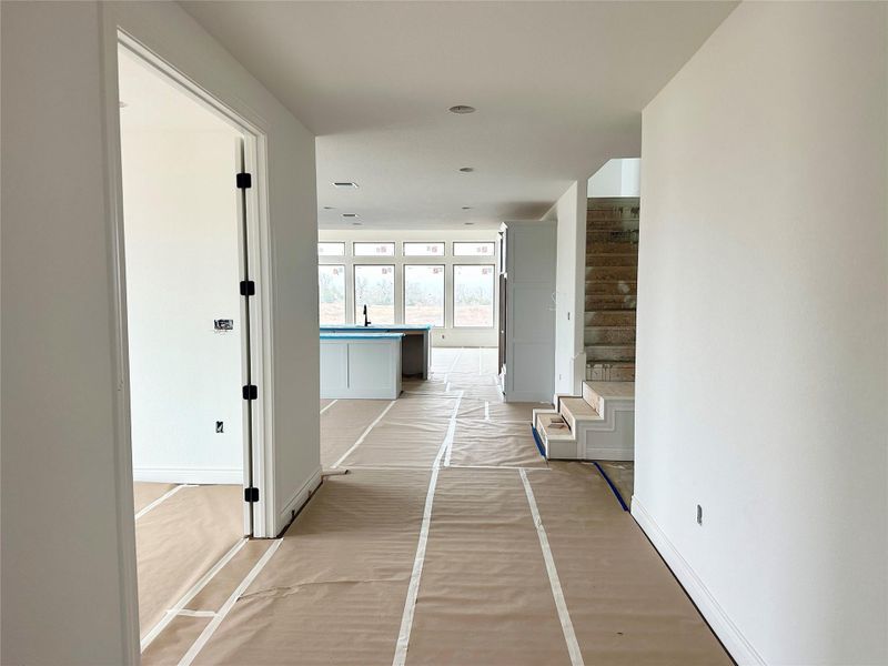 Corridor with stairs and baseboards