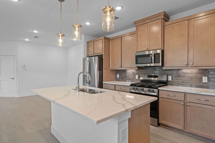 Furnished interior view inside a new home in Meridiana, Manvel (Image 5).