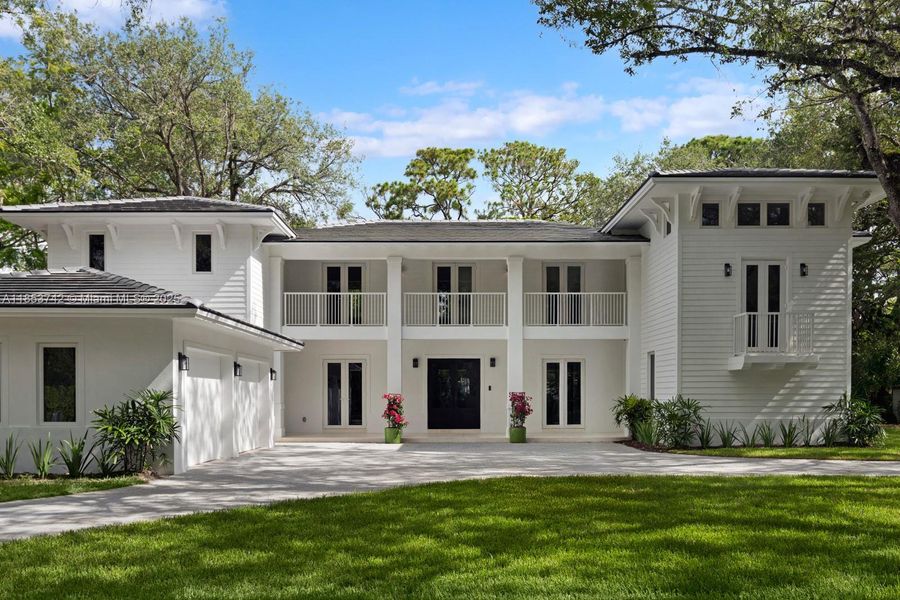 Front exterior of a new home in , South Miami, FL, highlighting curb appeal (Image 17). Front exterior of a new home in , South Miami, FL, highlighting curb appeal (Image 17).