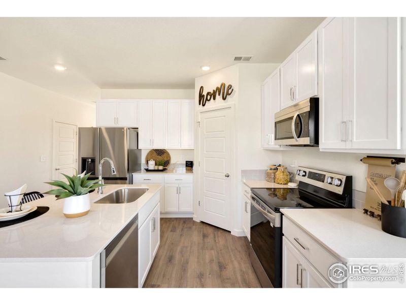 Stock Photos - home is complete! May contain additional upgrades. Come take a look! - Kitchen