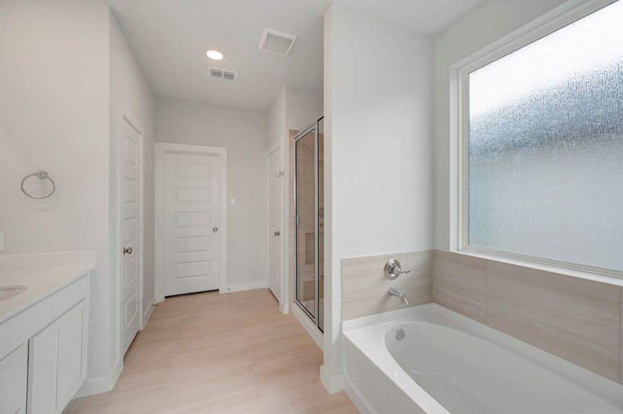 Furnished interior view inside a new home in Mason Woods, Cypress (Image 10).