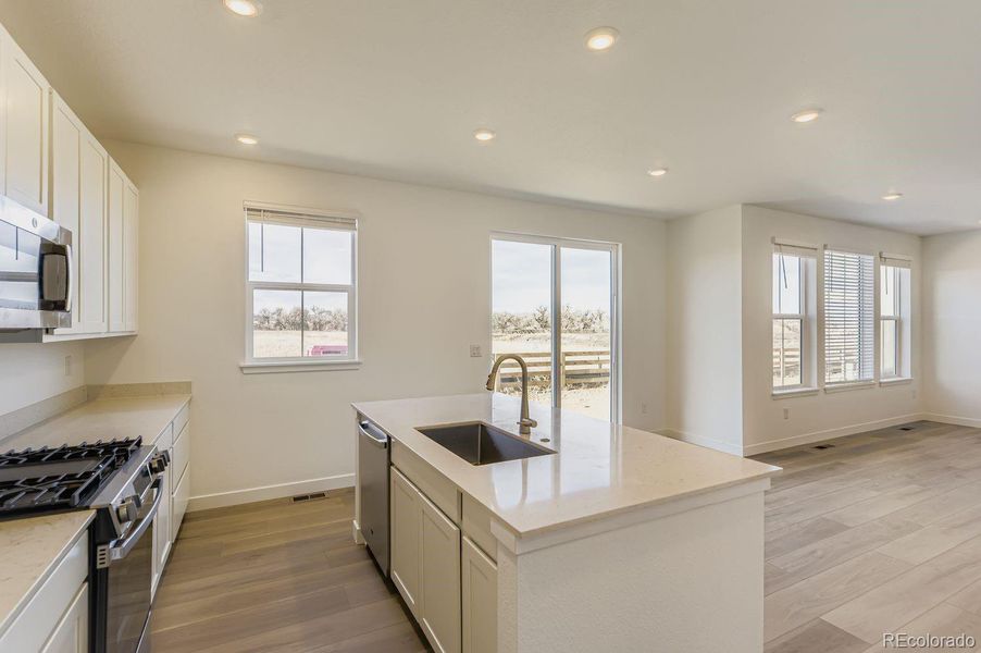 Furnished interior view inside a new home in Vermilion Creek: The Pioneer Collection, Centennial (Image 5).