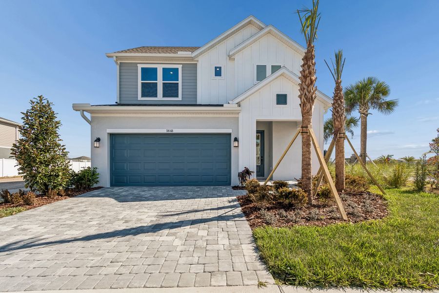 Representative exterior photo of a completed home built from the The Runion by David Weekley Homes in Chapel Crossings - Garden Series, Wesley Chapel, FL (Image 11).