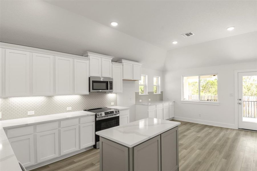 Furnished interior view inside a new home in Grande Estates, Bertram (Image 6).