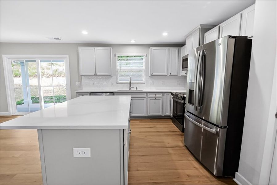 Furnished interior view inside a new home in Waverly Springs, Woodruff (Image 6).