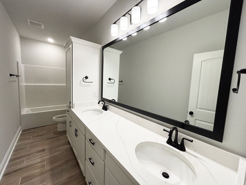 Furnished interior view inside a new home in Bird Song at Hammock Bay, Freeport (Image 9).