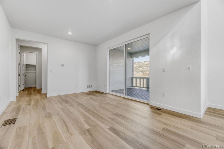 Spacious, unfurnished interior of a new home in Macanta: The Grand Collection, Castle Rock (Image 12).