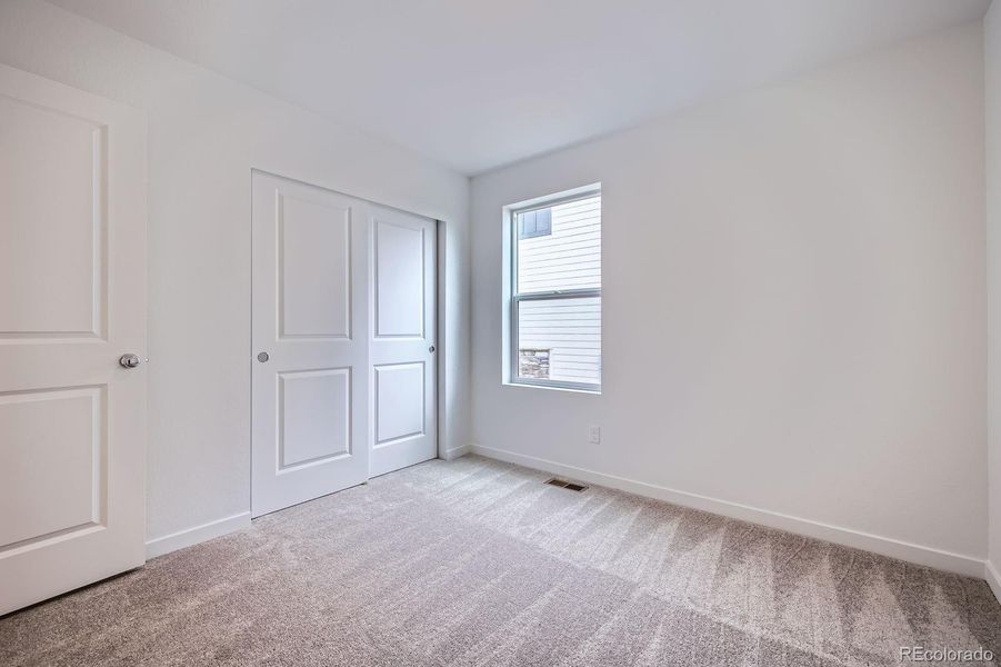 Spacious, unfurnished interior of a new home in Percheron: The Camden Collection, Colorado Springs (Image 10).