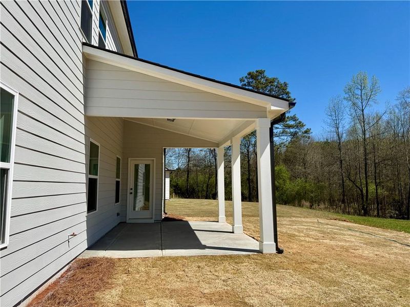 Exterior details and patio area of a home in Ponderosa Farms Estates, Gainesville (Image 4).