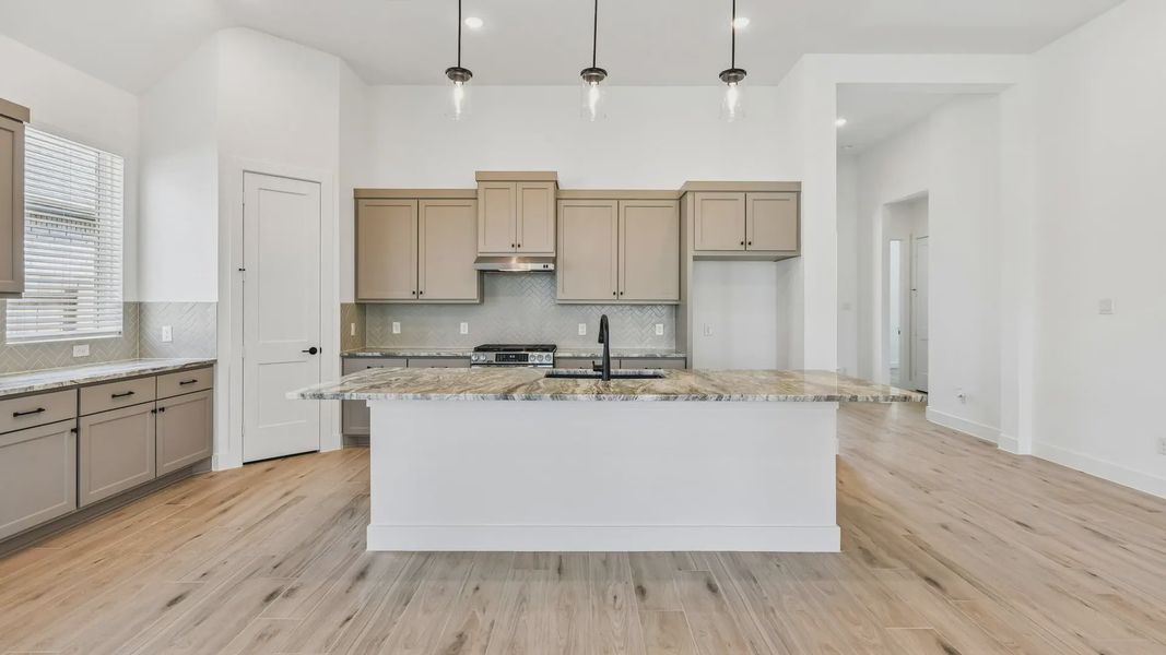 Furnished interior view inside a new home in Artavia, Conroe (Image 9).