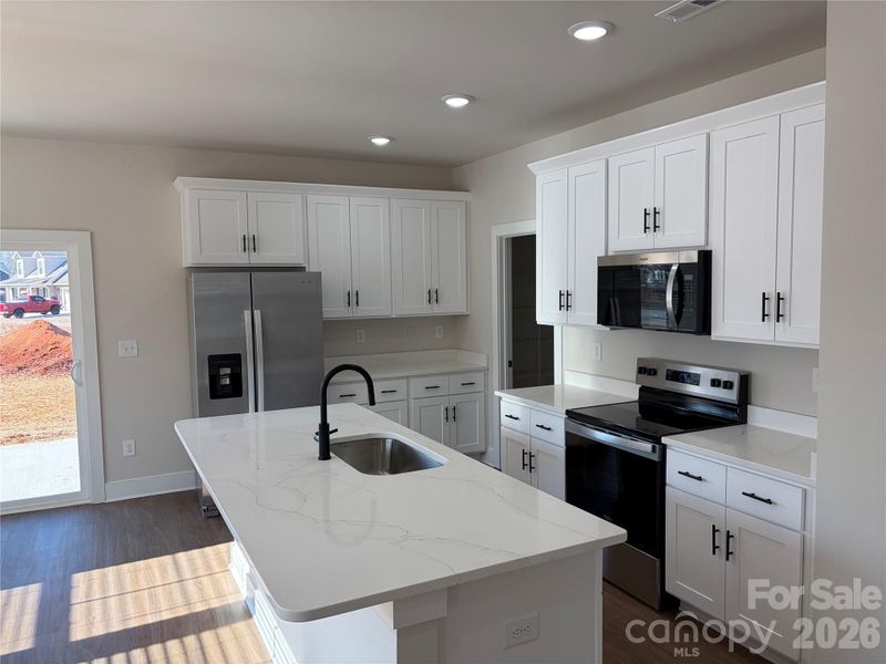 Furnished interior view inside a new home in , Lenoir (Image 4).