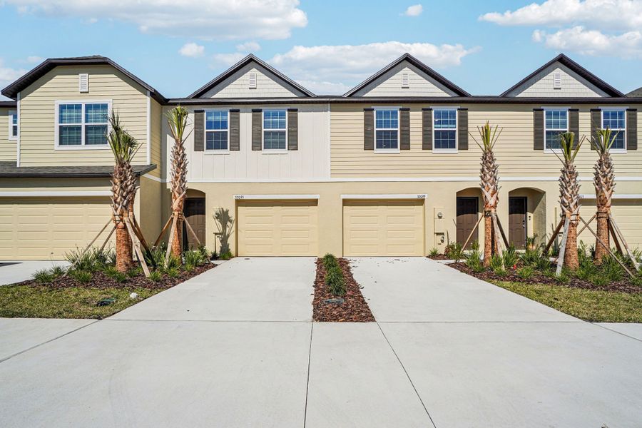 Front exterior of a new home in Mirada, San Antonio, FL, highlighting curb appeal (Image 23).