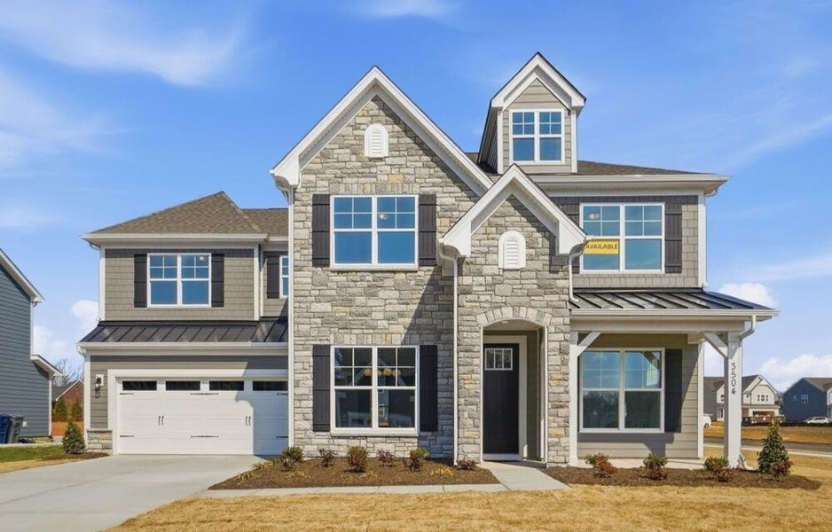 Representative exterior photo of a completed home built from the Colfax by Eastwood Homes in Hillcrest Grove, Wendell, NC (Image 2).