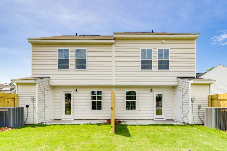 Exterior details and patio area of a home in Padgett Commons, Hopkins (Image 4).