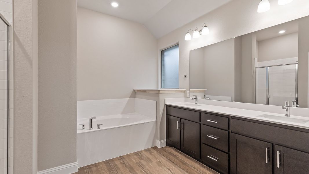 Representative furnished interior of a home built from the Odessa by D.R. Horton in Lakeview Pointe, Grand Prairie (Image 11).