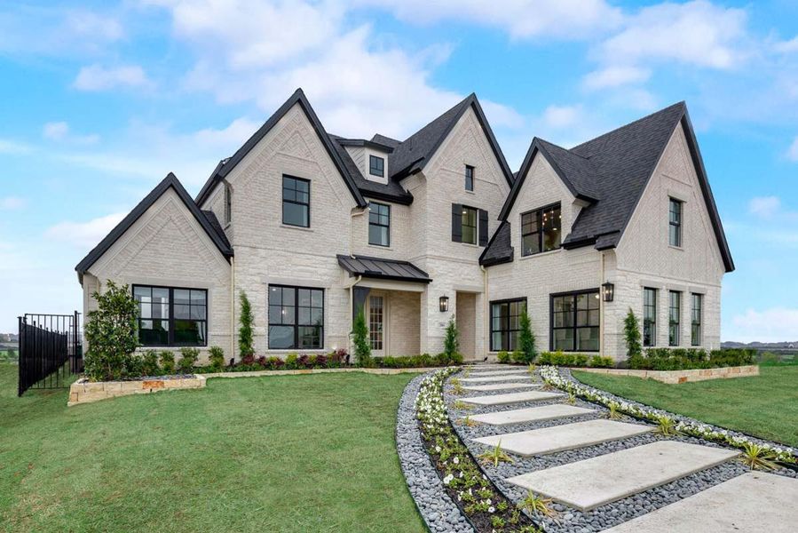 Front exterior of a new home in Wellspring Estates, Celina, TX, highlighting curb appeal (Image 1). Front exterior of a new home in Wellspring Estates, Celina, TX, highlighting curb appeal (Image 1).