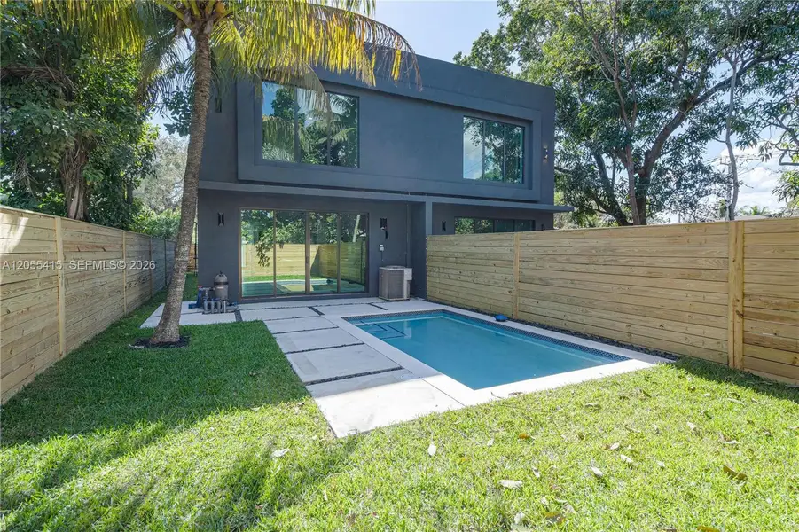 Exterior details and patio area of a home in , Miami (Image 4). Exterior details and patio area of a home in , Miami (Image 4).