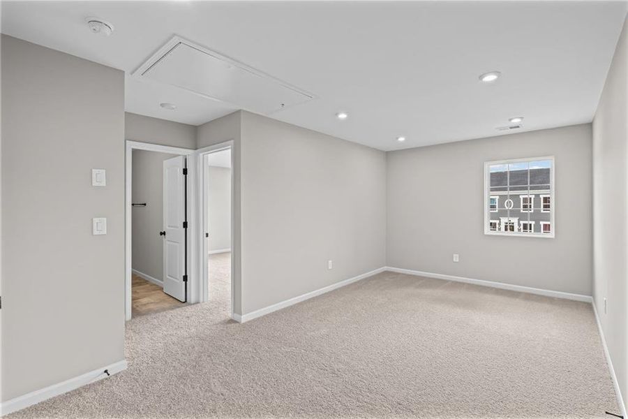 Spacious, unfurnished interior of a new home in The Reserve At Liberty Park, Braselton (Image 35).