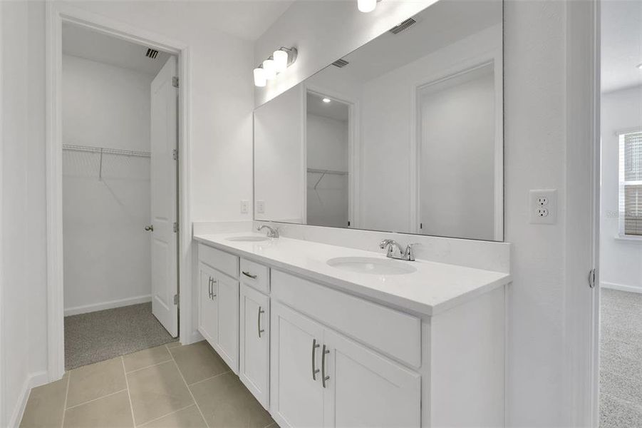 Furnished interior view inside a new home in Serenade at Ovation, Winter Garden (Image 10).