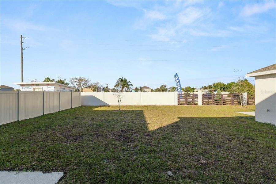 Exterior details and patio area of a home in Ranches at Lake McLeod, Eagle Lake (Image 21).