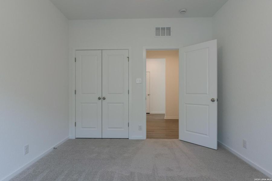 Spacious, unfurnished interior of a new home in Hennersby Hollow, San Antonio (Image 14).