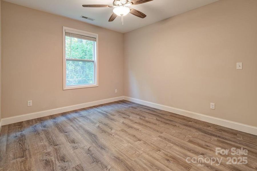 Spacious, unfurnished interior of a new home in , Black Mountain (Image 18).