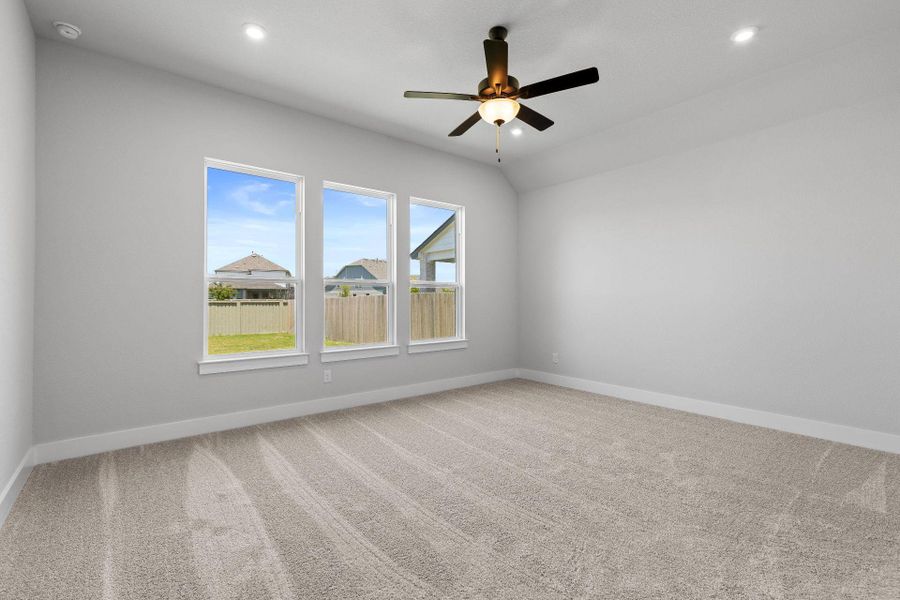 Primary Bedroom with elevated ceiling Primary Bedroom with elevated ceiling