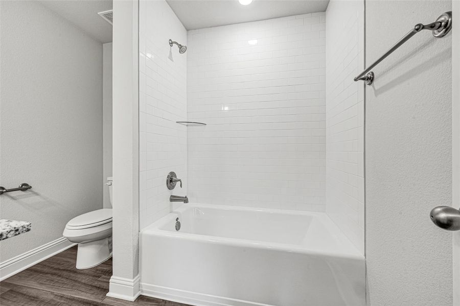 Furnished interior view inside a new home in Stonebrooke, Conroe (Image 7).