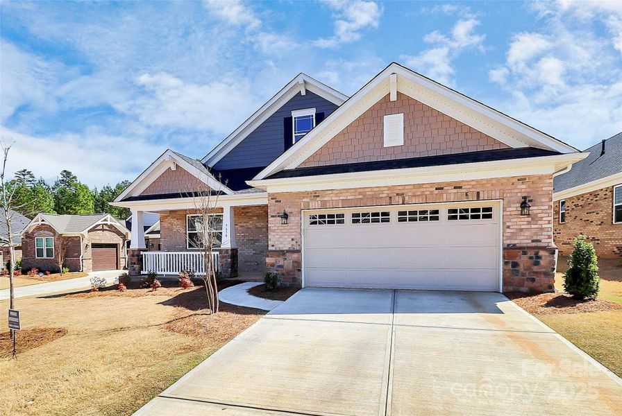 Front exterior of a new home in , Mint Hill, NC, highlighting curb appeal (Image 1).