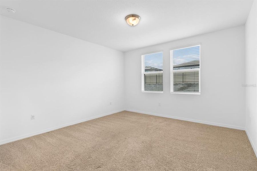 Spacious, unfurnished interior of a new home in Lawson Dunes - Signature Series, Haines City (Image 16).