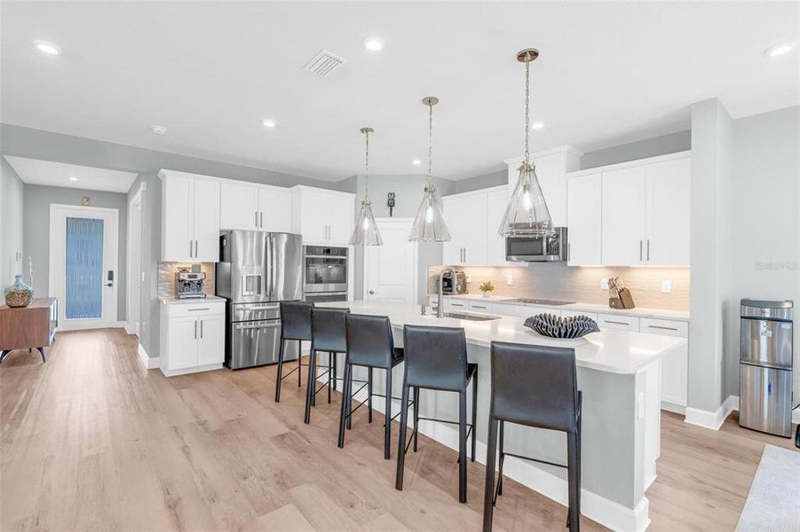Furnished interior view inside a new home in Bella Terra, Clermont (Image 39).