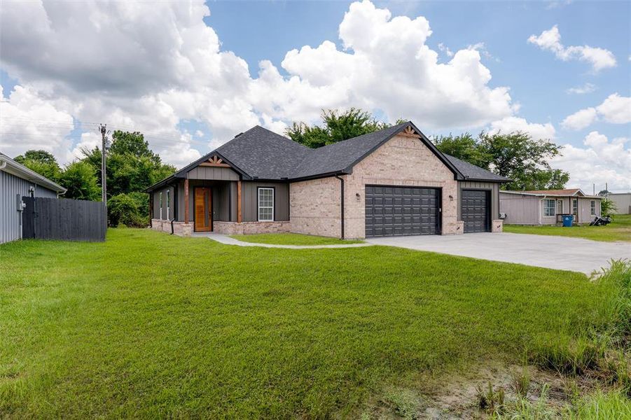 Front exterior of a new home in , Tool, TX, highlighting curb appeal (Image 22). Front exterior of a new home in , Tool, TX, highlighting curb appeal (Image 22).