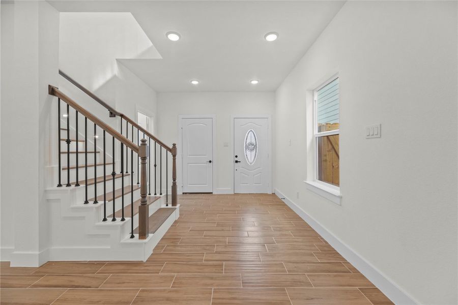 Recessed lighting creates a bright and illuminated interior. Providing a stunning contrast between the deep vanilla walls and the richly toned flooring, the glistening light enhances the appealing color scheme. Recessed lighting creates a bright and illuminated interior. Providing a stunning contrast between the deep vanilla walls and the richly toned flooring, the glistening light enhances the appealing color scheme.