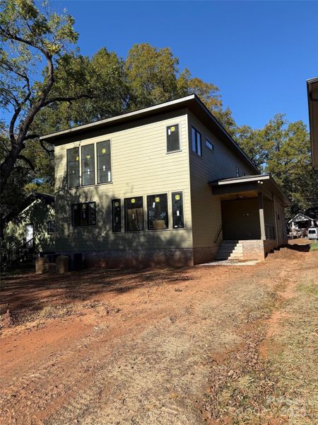 Exterior details and patio area of a home in , Charlotte (Image 11). Exterior details and patio area of a home in , Charlotte (Image 11).
