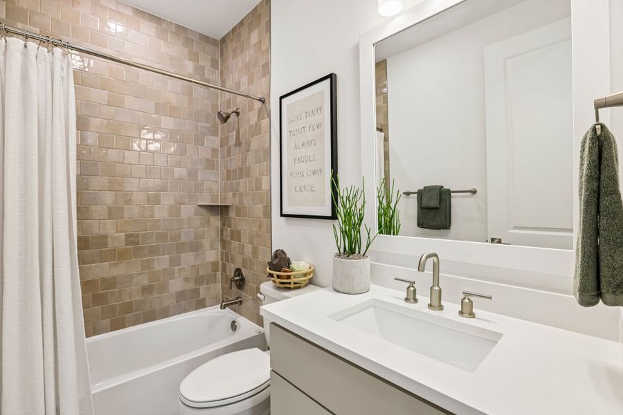 Representative furnished interior of a home built from the 5051 by Risewell Homes in Freedom at Anthem, Kyle (Image 26).