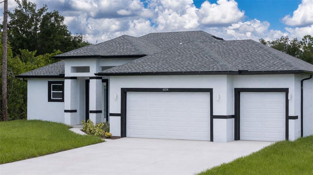 Front exterior of a new home in , Port Charlotte, FL, highlighting curb appeal (Image 30).