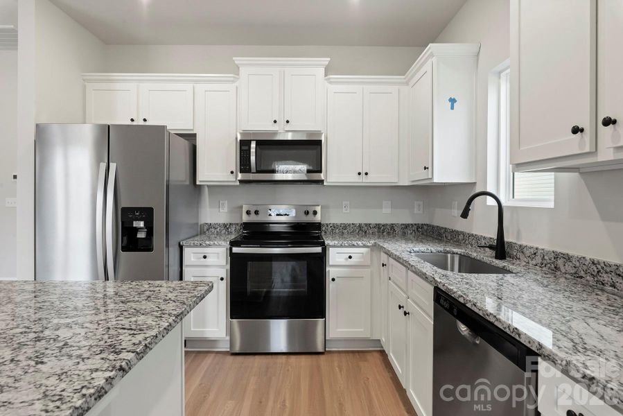 Furnished interior view inside a new home in Knights Bridge, Richburg (Image 3).