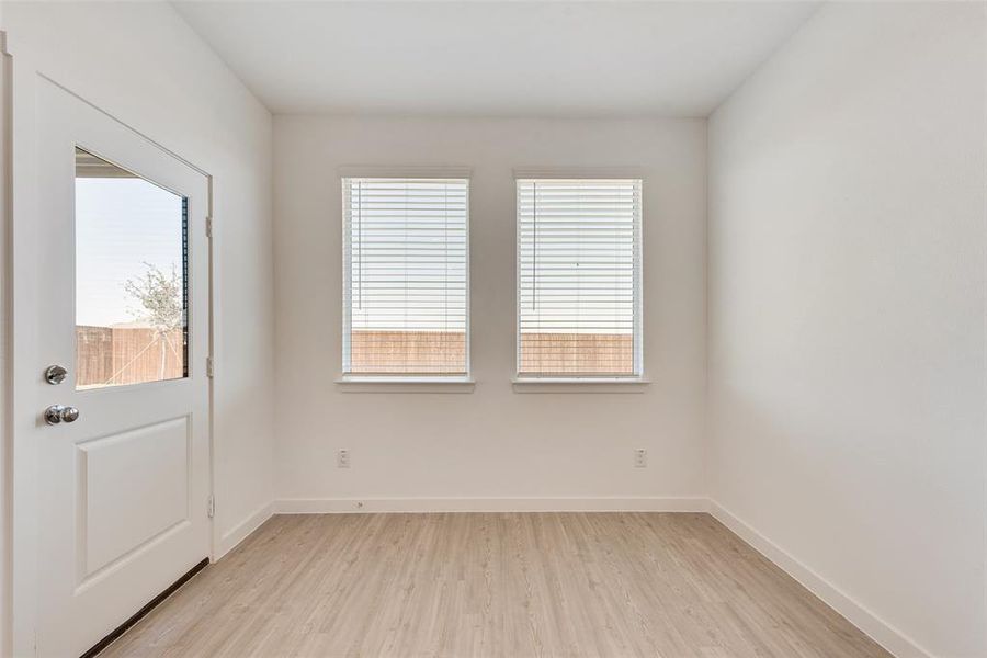 Empty room featuring light hardwood / wood-style floors