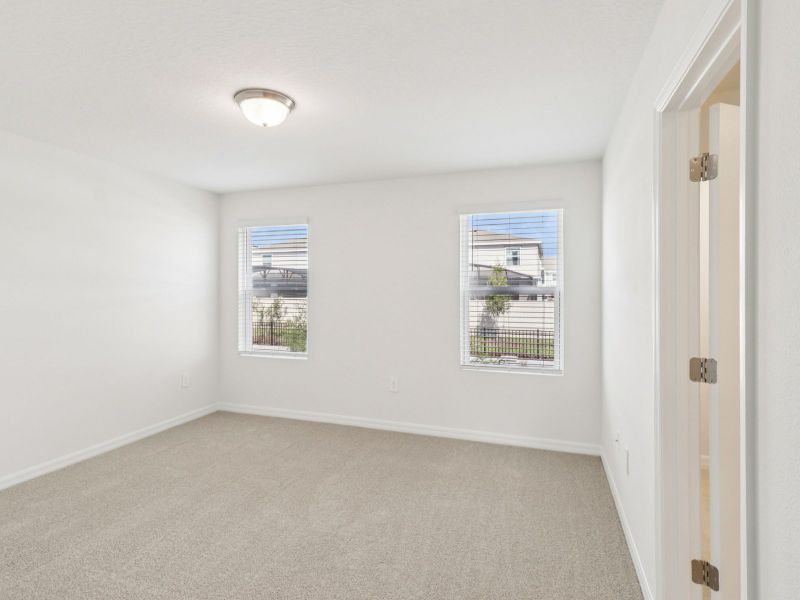Spacious, unfurnished interior of a new home in Cagan Crossings West, Clermont (Image 11).