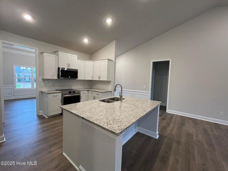 Furnished interior view inside a new home in Palmetto Creek, Bolivia (Image 5).